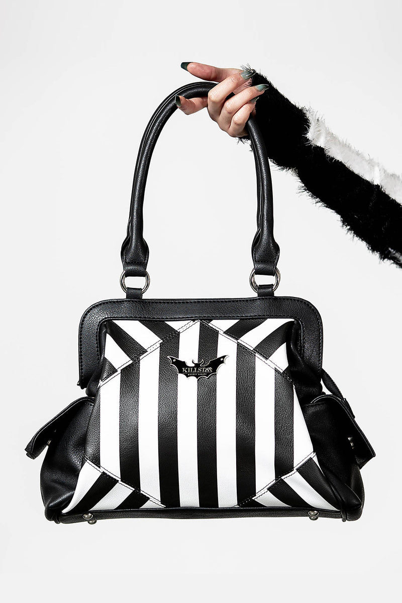Never Trust The Living Handbag